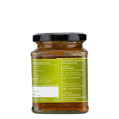 The Flavor Bag Amla Pickle in a glass jar, featuring a green label with nutrition facts and ingredients. Traditional South Indian recipe.