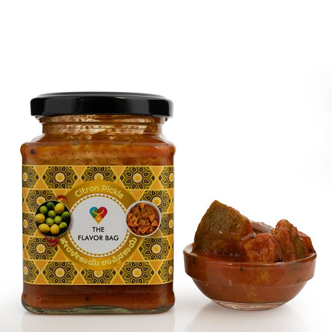 The Flavor Bag Citron Pickle in a jar with a small bowl of pickle. Traditional South Indian recipe.