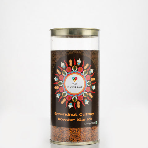 The Flavor Bag Groundnut Chutney Powder (Garlic) in a clear jar with a decorative label featuring peanuts, garlic, and chili peppers.