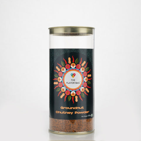 The Flavor Bag Groundnut Chutney Powder in a clear container with a decorative label featuring peanuts, chilies, and fruit.
