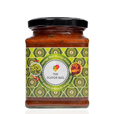 The Flavor Bag Jeerige Midi pickle in a glass jar with a green patterned label featuring traditional Indian motifs.