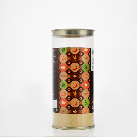 The Flavor Bag Menthya Hittu, a South Indian chutney powder in a clear jar with a decorative label featuring spices and grains.