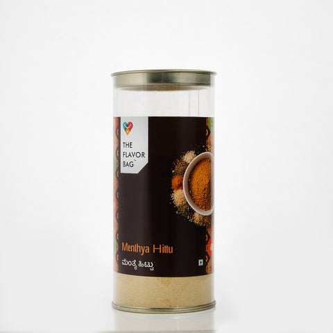 The Flavor Bag Menthya Hittu, a South Indian chutney powder made with roasted lentils and spices, in a clear plastic container.