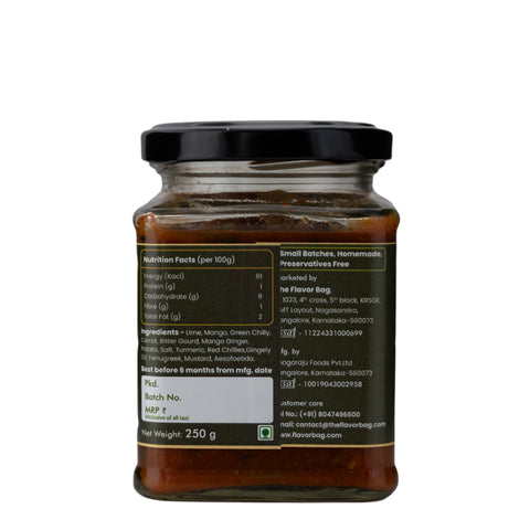 The Flavor Bag Mixed Vegetable Pickle in a glass jar, featuring a blend of lime, mango, green chili, carrot, and ginger. Authentic South Indian recipe.