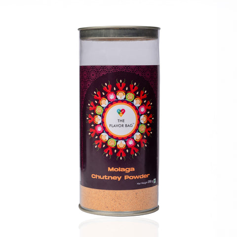 The Flavor Bag Molaga Podi spicy lentil and red chilli powder in a clear cylindrical container with decorative label