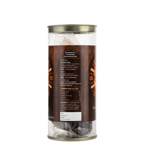 The Flavor Bag Puliyogare Gojju, a South Indian chutney powder made with lentils and spices, in a clear plastic container.