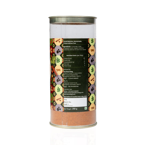 The Flavor Bag Rasam Powder in a clear cylindrical container showing ingredient list and nutrition facts label