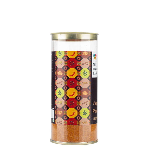 The Flavor Bag Vangibath Powder spice blend in a clear cylindrical container with a colourful spice-themed label.