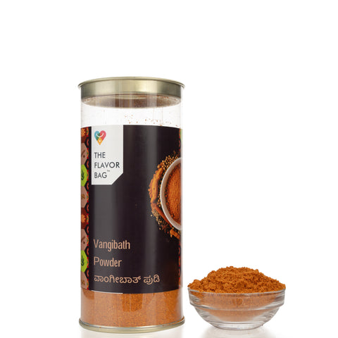 The Flavor Bag Vangibath Powder in a clear plastic container with a small glass bowl of powder beside it.