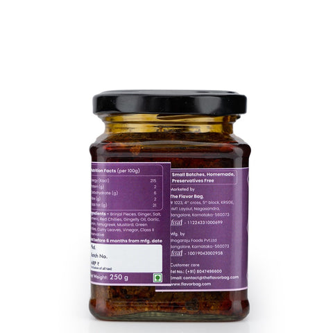 The Flavor Bag Brinjal Chutney in a glass jar, a traditional South Indian condiment made with brinjal pieces, ginger, salt, and spices.