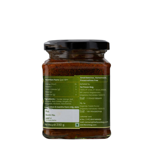 The Flavor Bag Midi Mango Pickle, a traditional South Indian condiment in a glass jar. Ingredients include tender mango, salt, turmeric, red chilies, gingerly oil, fenugreek, and mustard.